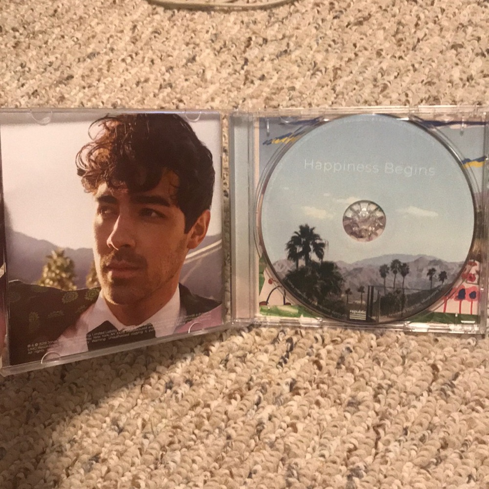 LIMITED EDITION JONAS BROTHERS HAPPINESS BEGINS